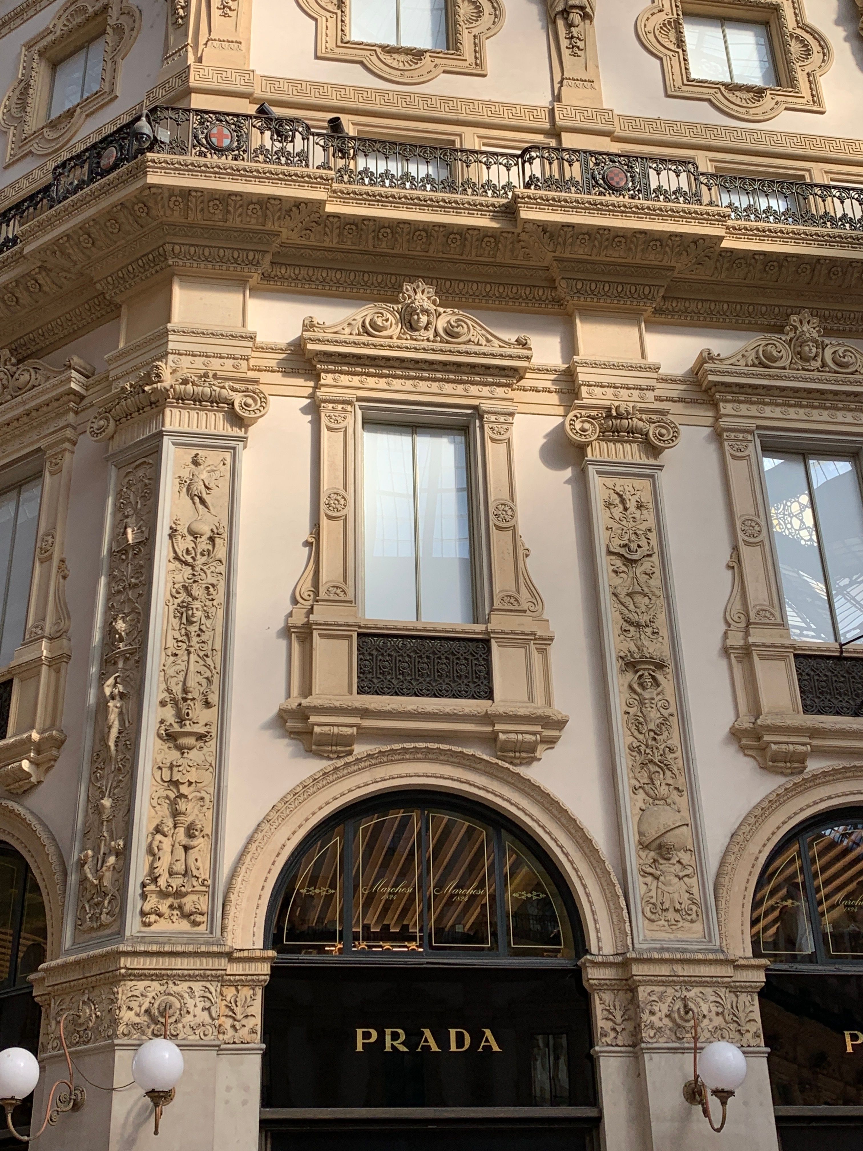 Prada storefront in an ornate gallery arcade